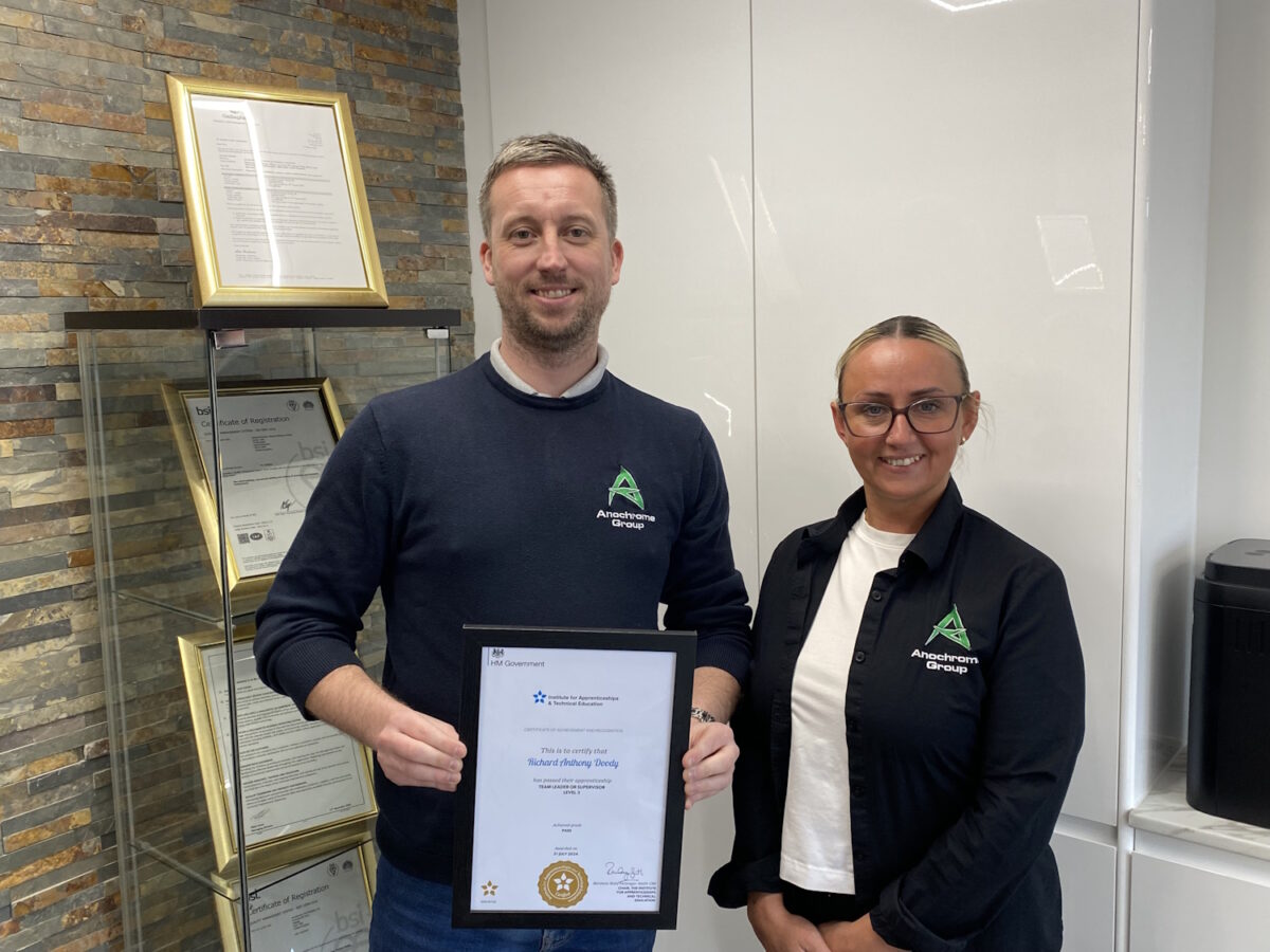 Production supervisor Ewelina Lewocka and Quality Engineer Richard Doody with certificates