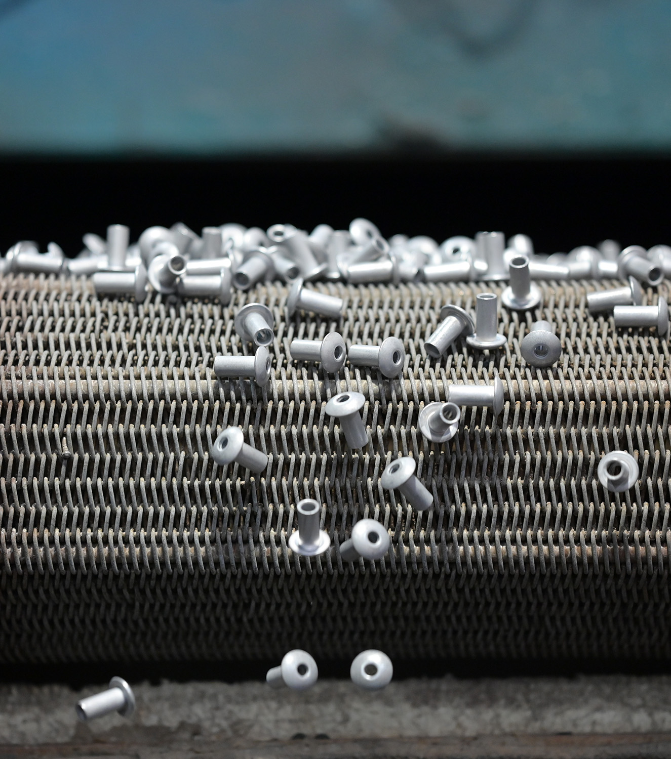 Bolts cascading around a machine