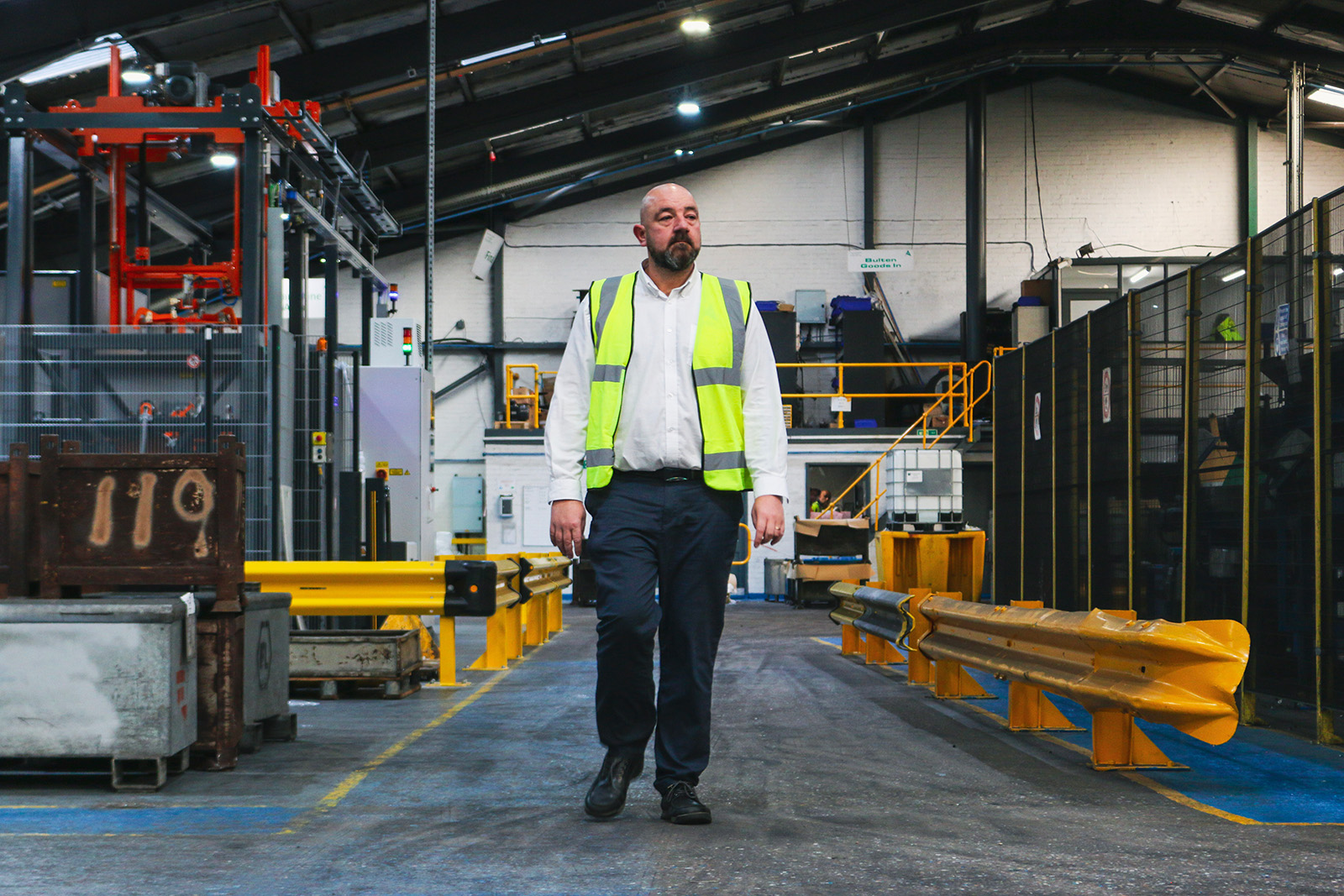 Andy Bate walking inside Wolverhampton Electro Plating Ltd